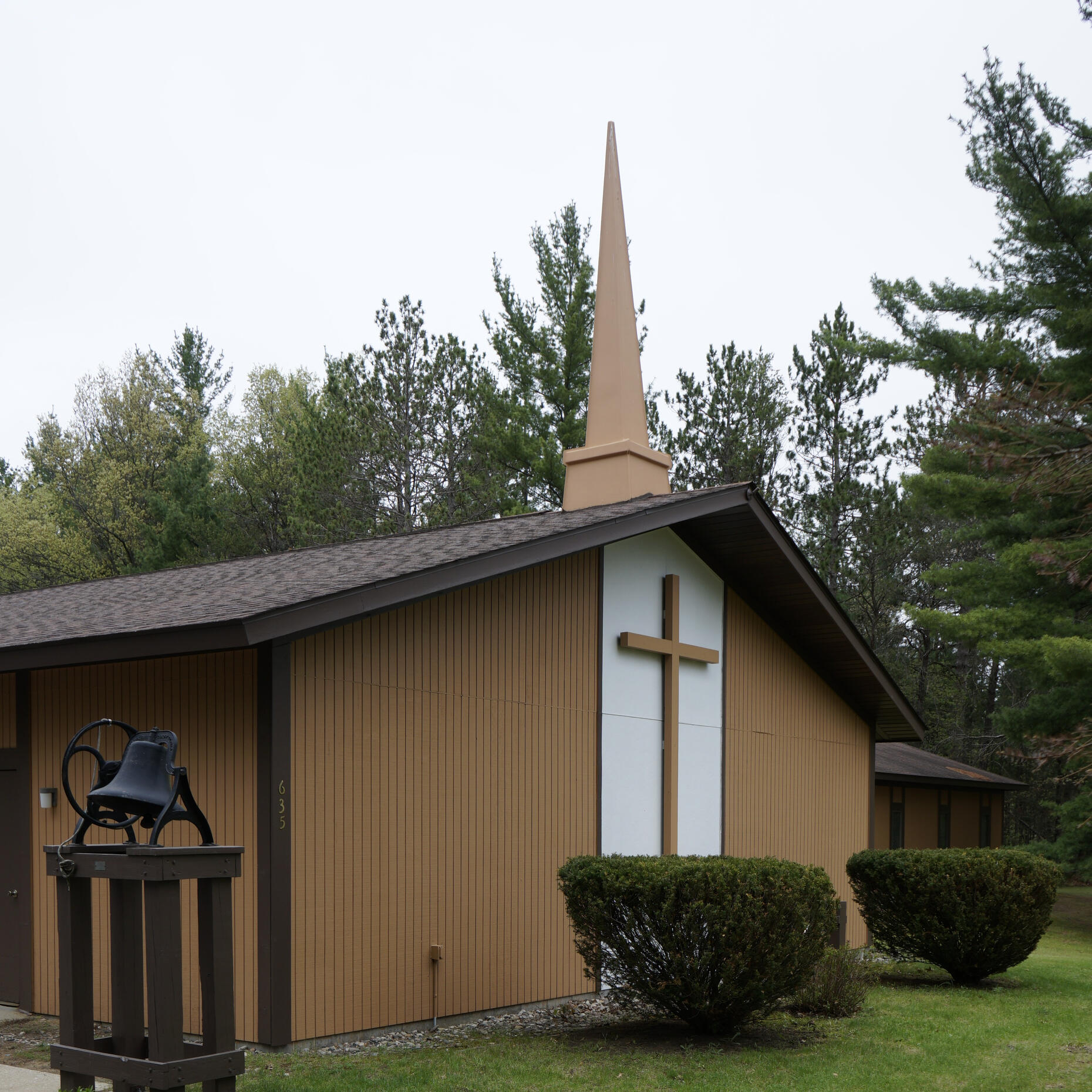 Exterior of a wooden church building: Hope Lutheran Church in St. Helen, MI.